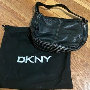 DKNY small shoulder bag in black leather with white stitching